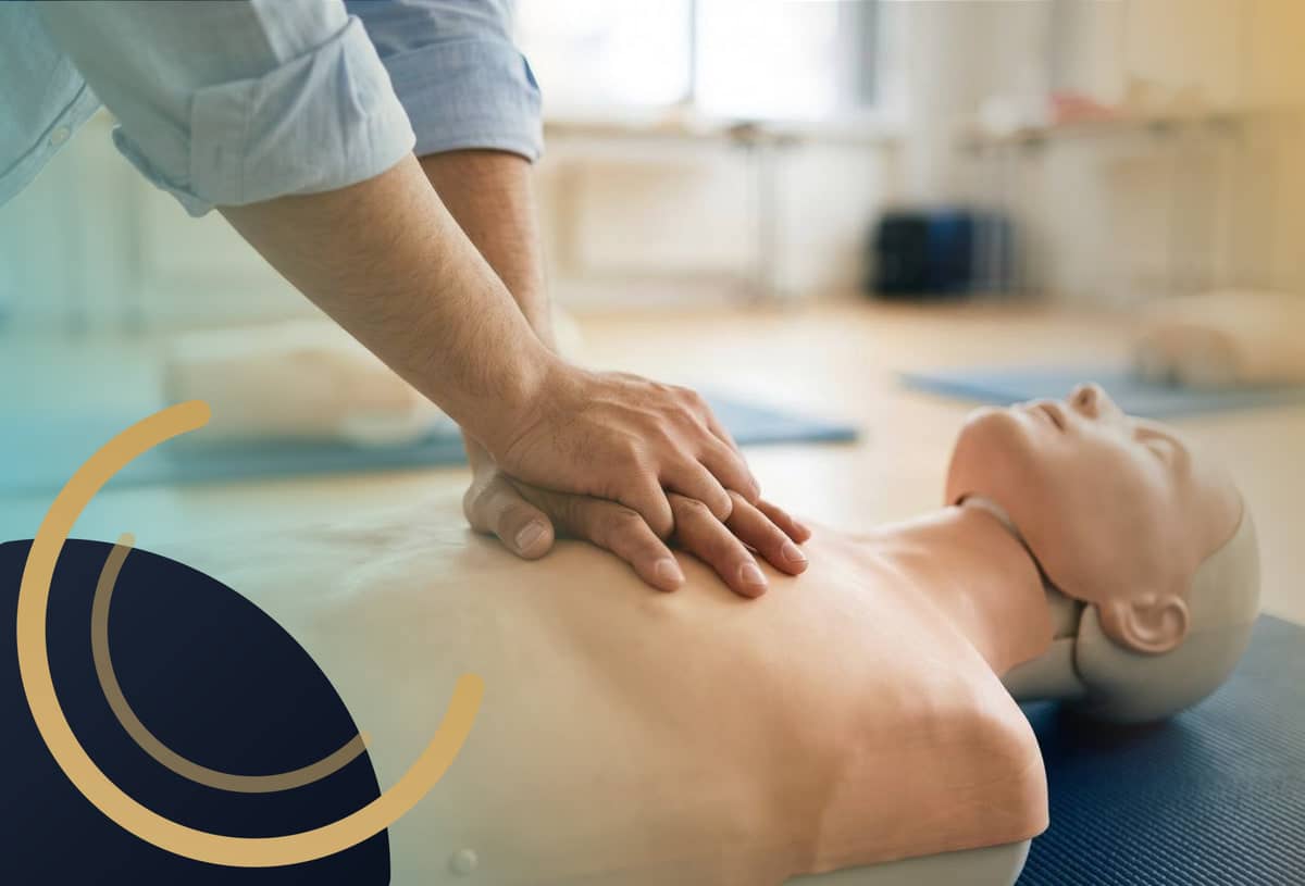 Practising first-aid skills on a training manikin